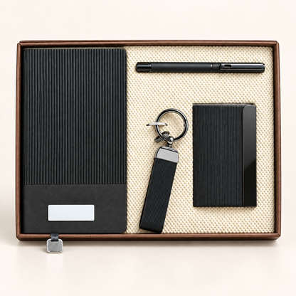 MP4904 black ribbed diary, executive pen, card holder and keychain arranged in presentation box