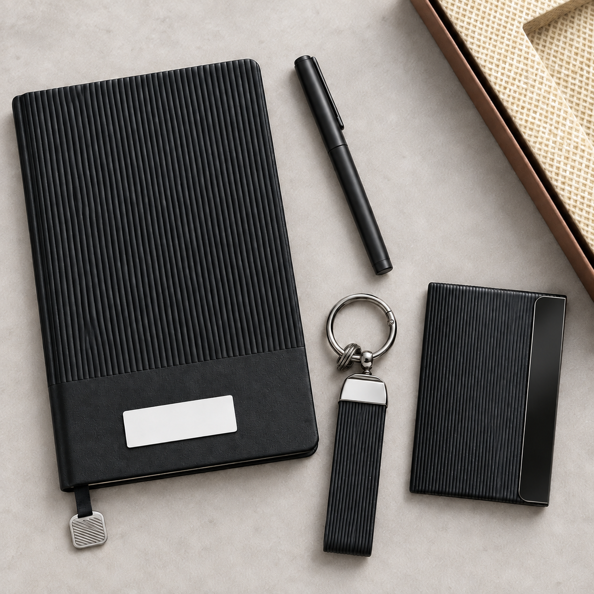 MP4904 diary with metal name plate, pen, keychain and card holder laid out flat